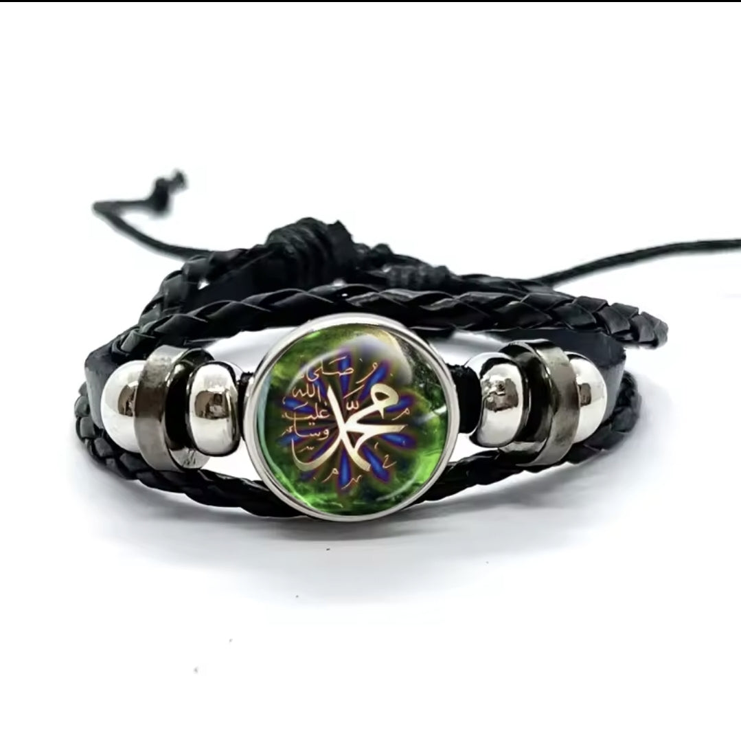 Islamic allah mohamed charm bracelet with a glass dome and snap button closure on stylish leather cord band.