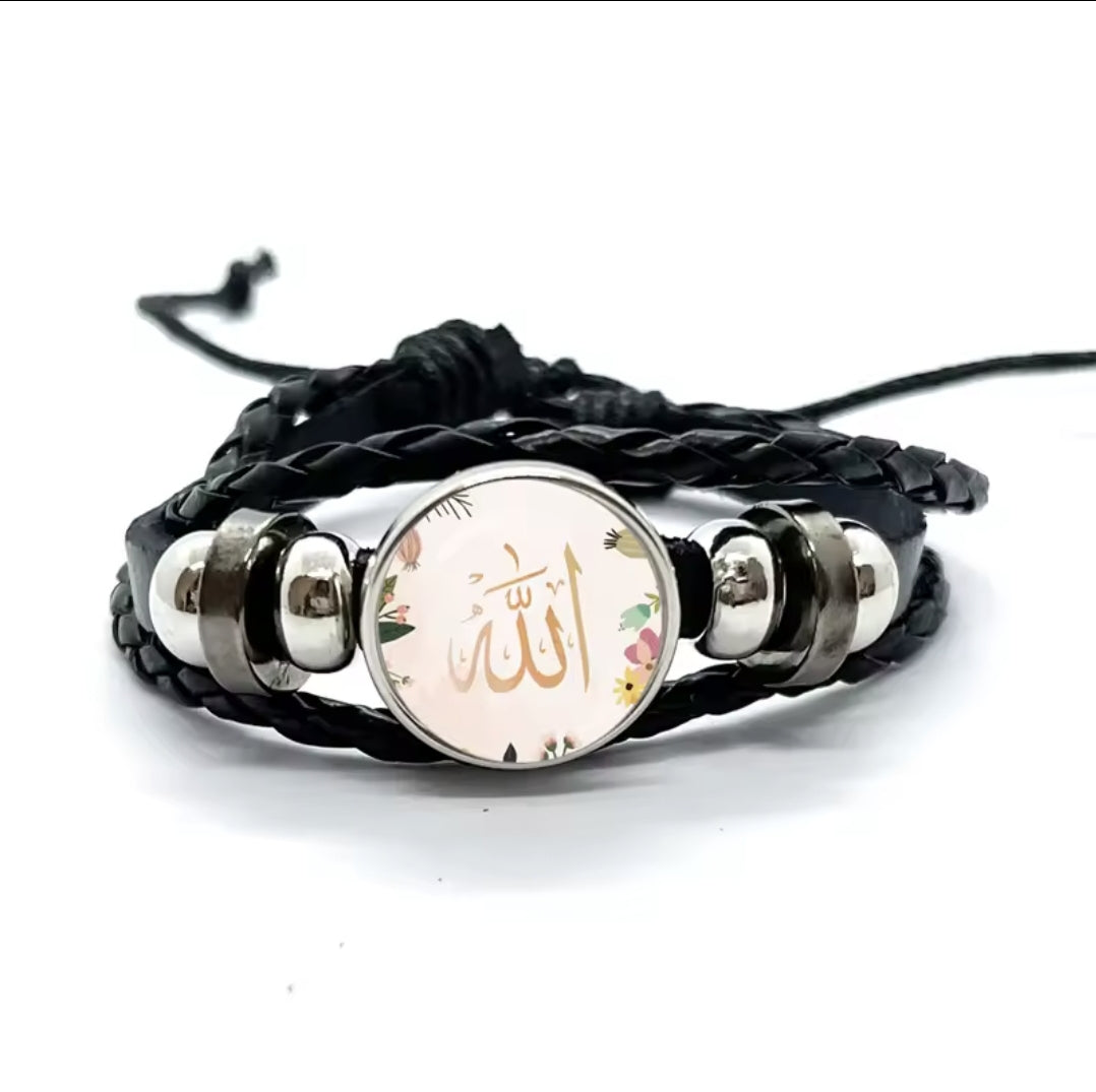 Islamic allah mohamed charm bracelet with a glass dome and snap button closure on stylish leather cord band.